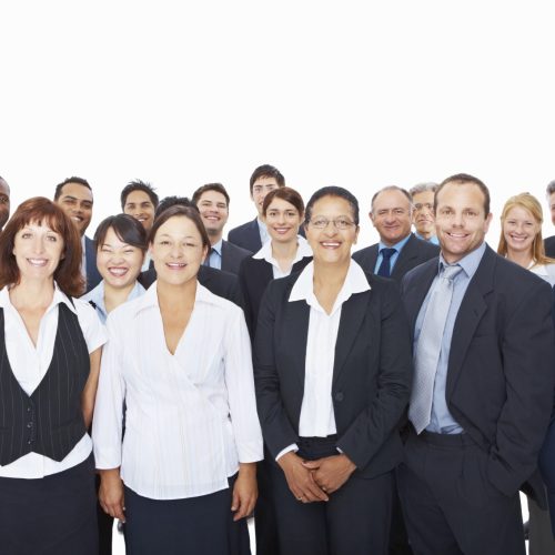 Group of smiling business people smiling over white background